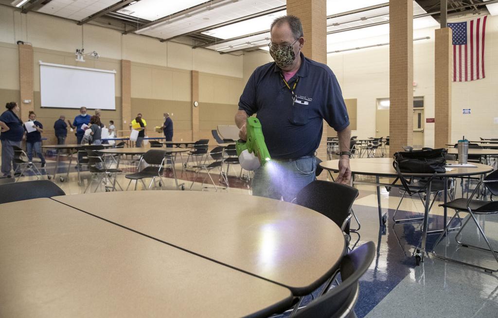 Janitor with Germ spray